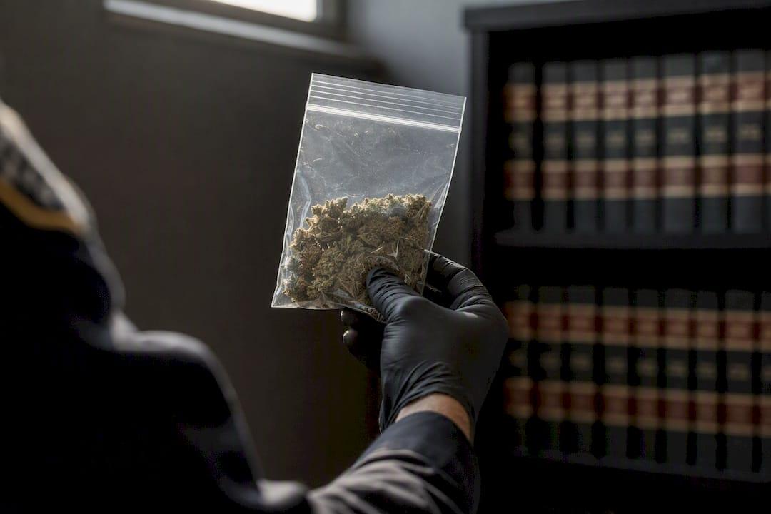 Granite Criminal Defense Evidence Bag With Cannabis Near Justice Folder